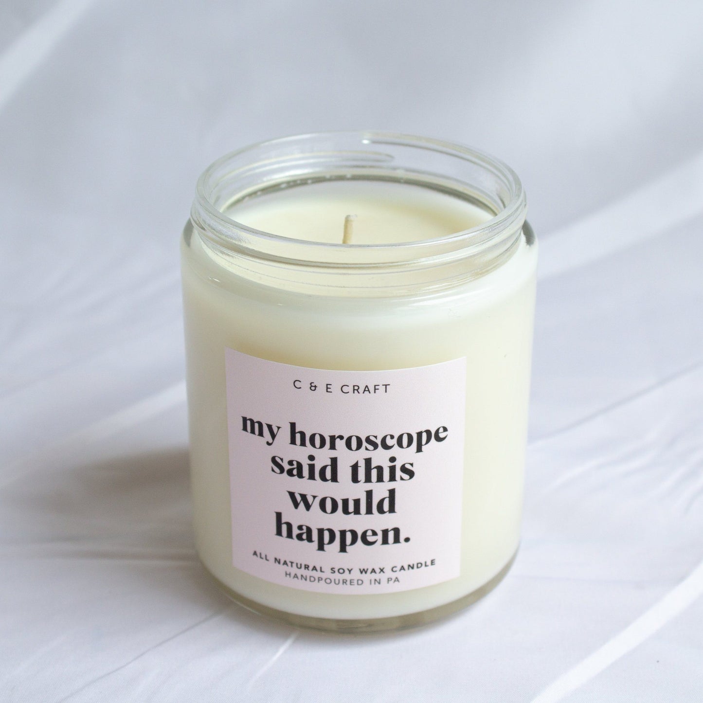 https://cecraft.co/cdn/shop/products/ce-my-horoscope-said-this-would-happen-candle-all-natural-soy-wax-scented-candle-gift-for-her-funny-candle-c-e-craft-co-777820_1445x.jpg?v=1618796157